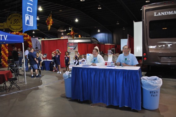 RVs and visitors on the show floor