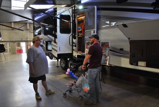 RVs and visitors on the show floor