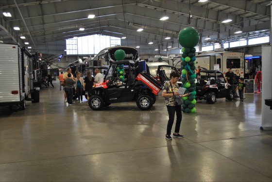 RVs and visitors on the show floor